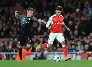 Arsenal V Bayern Munich 2016-17 Prints: Champions League Showdown: Oxlade-Chamberlain vs Kimmich