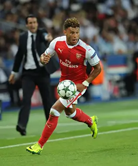 Paris Saint Gernain V Arsenal 2016-17 Prints: Champions League Showdown: Oxlade-Chamberlain's Standout Performance for Arsenal vs