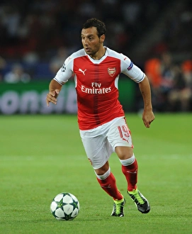 Paris Saint Gernain V Arsenal 2016-17 Prints: Champions League Showdown: Santi Cazorla vs
