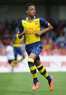 Images Dated 19th July 2014: Chris Willock in Action: Arsenal's Pre-Season Battle at Boreham Wood