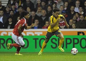 Nottingham Forest v Arsenal EPL Cup 3rd Round 2016-17 Collection: Chris Willock (Arsenal) Hildeberto Pereira (Forest). Nottingham Forest 0: 4 Arsenal