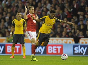 Images Dated 20th September 2016: Chuba Akpom (Arsenal) Chris Cohen (Forest). Nottingham Forest 0: 4 Arsenal. EPL League Cup