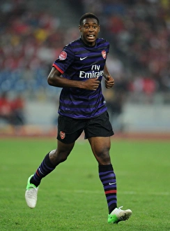 Malaysia XI V Arsenal 2012-13 Prints: Chuks Aneke in Action: Arsenal vs Malaysia XI (2012)