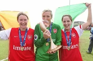Arsenal Ladies v Umea IK 2006-07 Collection: Ciara Grant, Emma Byrne and Yvonne Tracy (Arsenal) with the European Trophy