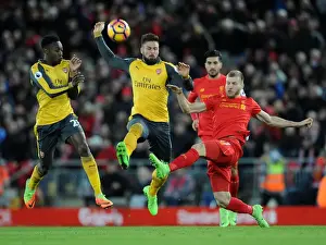 Liverpool V Arsenal 2016-17 Prints: Clash at Anfield: Arsenal's Welbeck and Giroud Pressure Liverpool's Klavan (Premier League 2016-17)