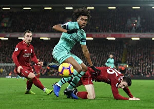 Images Dated 29th December 2018: Clash at Anfield: Iwobi vs Robertson - Premier League Showdown (2018-19)