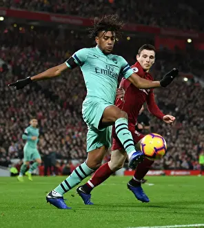 Clash at Anfield: Iwobi vs Robertson in Premier League Showdown