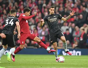 Clash at Anfield: Kiwior vs. Firmino - A Premier League Battle