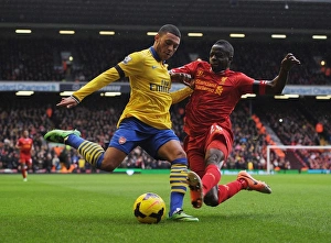 Liverpool V Arsenal 2013-14 Prints: Clash at Anfield: Oxlade-Chamberlain vs. Cissokho