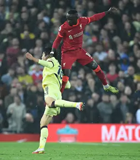 Clash at Anfield: Tomiyasu Fouls Mane - Intense Rivalry in Premier League Football