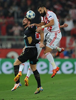 Olympiacos V Arsenal 2015-16 Prints: Clash in Athens: Olivier Giroud vs
