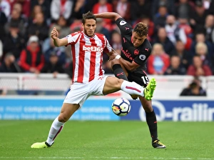 Clash at the Bet365: Oxlade-Chamberlain vs Pieters