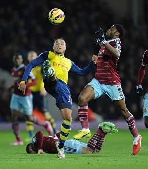 West Ham United V Arsenal 2014-15 Prints: Clash at the Boleyn: Oxlade-Chamberlain vs