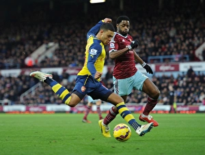 West Ham United V Arsenal 2014-15 Prints: Clash at the Boleyn: Oxlade-Chamberlain vs. Song