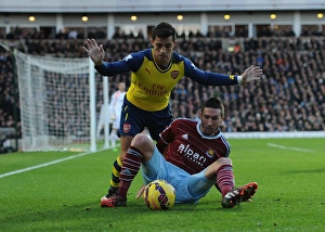 West Ham United V Arsenal 2014-15 Prints: Clash at the Boleyn: Sanchez vs. Amalfitano - Arsenal vs. West Ham, Premier League 2014-15
