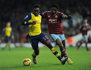 West Ham United V Arsenal 2014-15 Prints: Clash at the Boleyn: Welbeck vs