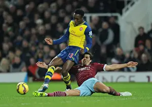 West Ham United V Arsenal 2014-15 Prints: Clash at the Boleyn: Welbeck vs