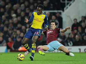 West Ham United V Arsenal 2014-15 Prints: Clash at the Boleyn: Welbeck vs