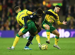 Clash at Carrow Road: Saka Faces Off Against Norwich Duo