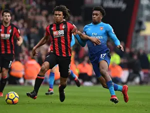 AFC Bournemouth V Arsenal 2017-18 Prints: Clash of Champions: Iwobi vs Ake in AFC Bournemouth vs Arsenal Premier League Showdown