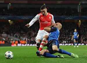 Images Dated 25th February 2015: Clash of Champions: Oxlade-Chamberlain vs. Abdennour in Arsenal's UEFA Battle