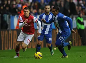 Wigan Athletic V Arsenal 2012-13 Prints: Clash of Champions: Ramsey vs. Beausejour - Wigan Athletic vs