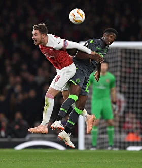 Images Dated 8th November 2018: Clash of Champions: Ramsey vs. Diaby in Arsenal's Europa League Battle
