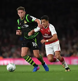 Arsenal V Doncaster Rovers - Carabao Cup 2017-18 Prints: Clash of Champions: Sanchez vs. Houghton in Arsenal's Carabao Cup Battle