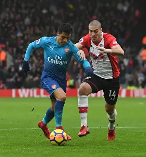 Southampton V Arsenal 2017-18 Prints: Clash of Champions: Sanchez vs. Romeu in Southampton v Arsenal Premier League Showdown