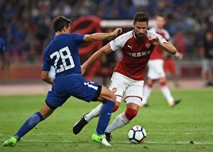 Images Dated 23rd July 2017: Clash in China: Arsenal's Giroud vs. Chelsea's Azpilicueta