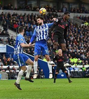 Images Dated 4th March 2018: Clash at the Coast: Welbeck vs. Propper in Intense Battle at Brighton-Arsenal Premier League