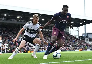 Fulham V Arsenal 2018-19 Prints: Clash at Craven Cottage: Fulham's Tim Ream Holds Off Arsenal's Danny Welbeck
