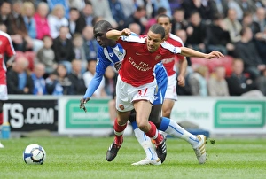 Wigan Athletic V Arsenal 2009-10 Prints: Clash at DW Stadium: Mohamed Diame Outshines Craig Eastmond as Wigan Athletic Edge Arsenal 3-2 in FA Premier League