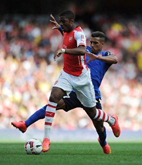 Arsenal V AS Monaco 2014-15 Prints: Clash at the Emirates: Akpom vs. Dirar - Arsenal vs. AS Monaco, 2014