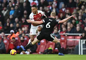Arsenal V Burnley 2018-19 Prints: Clash at Emirates: Aubameyang vs Mee in Arsenal's Battle Against Burnley