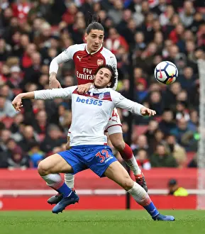 Arsenal V Stoke City 2017-18 Prints: Clash at the Emirates: Bellerin vs. Sobhi in Arsenal's Battle Against Stoke City