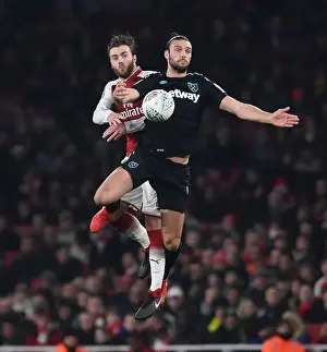 Arsenal V West Ham United - Carabao Cup 2017-18 Prints: Clash at the Emirates: Chambers vs. Carroll in Carabao Cup Showdown