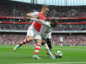 Arsenal V Tottenham Hotspur 2014-15 Prints: Clash at the Emirates: Chambers vs. Rose in Arsenal vs. Tottenham Rivalry