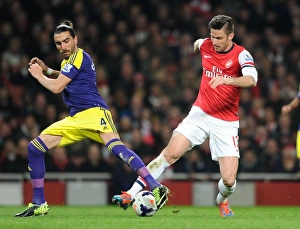Arsenal V Swansea City 2013-14 Prints: Clash at Emirates: Giroud vs. Flores, Arsenal vs. Swansea City, Premier League 2013-14