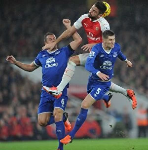 Images Dated 24th October 2015: Clash at Emirates: Giroud vs Jagielka & Stones - A Battle for Supremacy (Arsenal vs Everton)