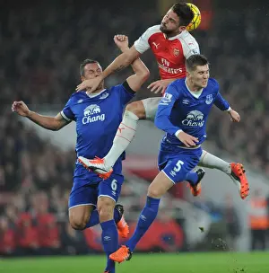 Arsenal V Everton 2015/16 Prints: Clash at Emirates: Giroud vs Jagielka & Stones - A Battle for Supremacy (Arsenal vs Everton)
