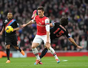 Arsenal V Crystal Palace 2013-14 Prints: Clash at Emirates: Giroud vs Jedinak in Arsenal's Battle Against Crystal Palace