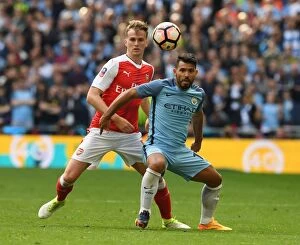 Arsenal v Manchester City - FA Cup 1/2 Final 2017 Collection: Clash at the Emirates: Holding vs. Aguero - FA Cup Semi-Final Showdown