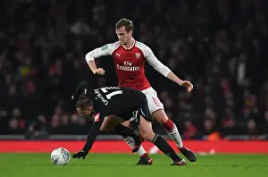 Clash at the Emirates: Holding vs. Hernandez in the Carabao Cup Quarterfinals