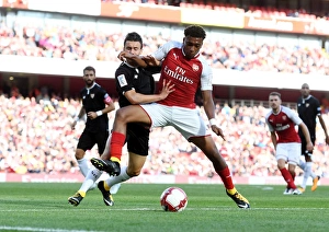 Arsenal V Seville - Emirates Cup 2017-18 Prints: Clash at the Emirates: Iwobi vs. Corchia - Arsenal vs. Sevilla FC (Emirates Cup 2017-18)