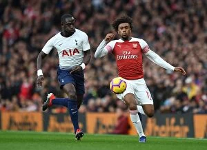 Images Dated 2nd December 2018: Clash at the Emirates: Iwobi vs. Sissoko - Arsenal vs. Tottenham, Premier League 2018-19