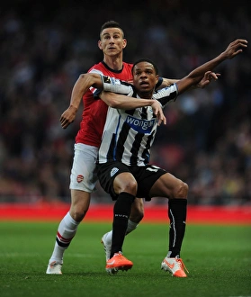Arsenal V Newcastle United 2013/14 Prints: Clash at Emirates: Koscielny vs. Remy