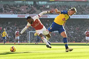 Arsenal V Southampton 2018-19 Prints: Clash at Emirates: Lacazette vs. Vestergaard - Arsenal vs. Southampton, Premier League