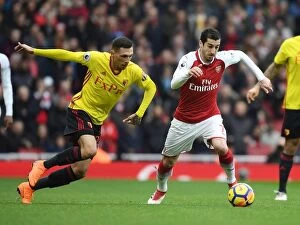 Images Dated 11th March 2018: Clash at the Emirates: Mkhitaryan vs Holebas in Arsenal's Battle against Watford