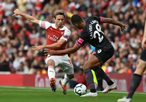 Arsenal V Everton 2018-19 Prints: Clash at Emirates: Monreal vs Calvert-Lewin in Arsenal's Battle Against Everton (2018-19)